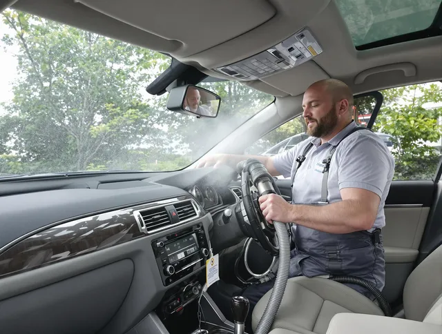Central Falls Air Duct Cleaning specialist performing professional car duct cleaning in Central Falls
